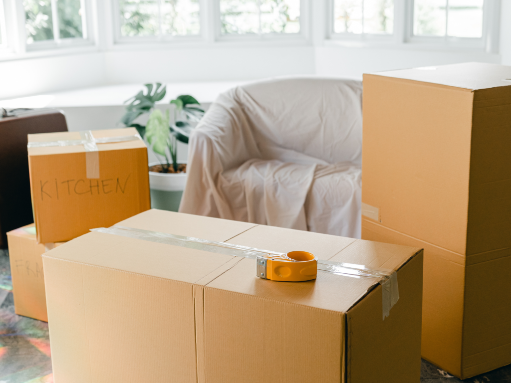 moving costs to buying a home / moving boxes.